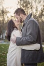 Romantic young couple kissing outside on a cold fall day Royalty Free Stock Photo