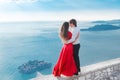 Romantic young couple in love over sea shore background. Fashion Royalty Free Stock Photo