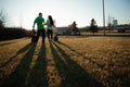 Romantic young couple portrait playing guitar under blue sky. Royalty Free Stock Photo