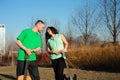 Romantic young couple portrait playing guitar under blue sky Royalty Free Stock Photo