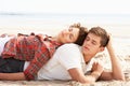 Romantic Young Couple Relaxing On Beach Royalty Free Stock Photo