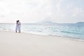 Romantic young couple on the sea shore Royalty Free Stock Photo