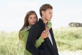 Romantic Young Couple Standing By Dunes Royalty Free Stock Photo