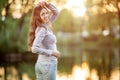 Romantic young girl outdoors enjoying nature Beautiful Model in Royalty Free Stock Photo