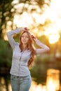 Romantic young girl outdoors enjoying nature Beautiful Model in Royalty Free Stock Photo