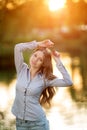 Romantic young girl outdoors enjoying nature Beautiful Model in Royalty Free Stock Photo