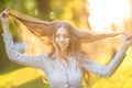 Romantic young girl outdoors enjoying nature Beautiful Model in Royalty Free Stock Photo