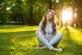 Romantic young girl outdoors enjoying nature Beautiful Model in Royalty Free Stock Photo