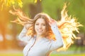 Romantic young girl outdoors enjoying nature Beautiful Model in Royalty Free Stock Photo