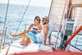 Romantic lovers spending time together and relaxing on yacht Royalty Free Stock Photo