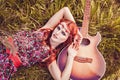 Romantic youth girl with her guitar, summer, hippie style Royalty Free Stock Photo