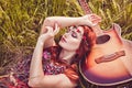 Romantic youth girl travelling with her guitar Royalty Free Stock Photo