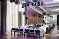 Romantically decorated wedding hall with reflectors, and a set table for the wedding celebration, Royalty Free Stock Photo
