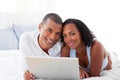 Romantice couple using a laptop Royalty Free Stock Photo