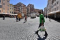 Rome April 2020 - Supermarket employee delivering food with mask during lockdown