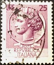Stamp issued by the Italian Republic with an ancient Syracusan coin in the effigy