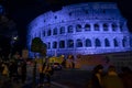 Rome coliseum facade with blue light projection to commemorate international epilepsy day