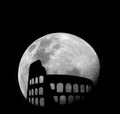 Rome coliseum at night with moon Royalty Free Stock Photo