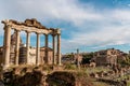 Rome - The columns of the Temple of Saturn and overview of the ancient ruins of the Roman Forum Royalty Free Stock Photo