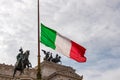 Rome - Italian national flag with scenic view on the front facade of Victor Emmanuel II monument on Piazza Venezia in Rome Royalty Free Stock Photo