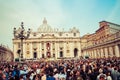 Rome, Italy - April 24, 2011: Crowds gather outside St. Peter`s Basillica in Rome on Easter Sunday.