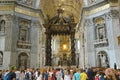 ROME, ITALY - APRIL 6, 2016: faithfuls and tourists inside of St. Peter Basilica in the Vatican Royalty Free Stock Photo