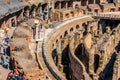 ROME, ITALY - APRIL 24, 2017. Inside view of The Colosseum with tourists sightseeing. Royalty Free Stock Photo