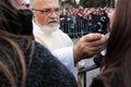 Communion during the settlement of Pope Francis, St John, Rome