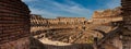 Panorama of the interior of the Roman Colosseum showing the arena and the hypogeum in a beautiful sunny