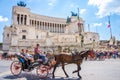 ROME, ITALY, 24 APRIL 2017. Venezia Square /Piazza Venezia/ and Victor Emmanuel Palace with tourists sightseeing. Royalty Free Stock Photo