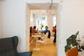 ROME, ITALY - APRIL 09 2022: Women talk sitting at small round table in cozy cafe