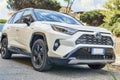 Beautiful white suv car model Toyota Rav4 Hybrid produced by Japanese Toyota Motor Corporation