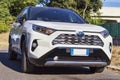 Beautiful white suv car model Toyota Rav4 Hybrid produced by Japanese Toyota Motor Corporation