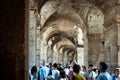 Ruins of the gated arch of the passage at the entrance of the Roman Colosseum in Rome, Italy Royalty Free Stock Photo