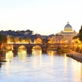 Rome, Italy, Basilica di San Pietro and Sant Angelo bridge at sunset Royalty Free Stock Photo