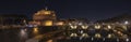 Rome Italy. Beautiful view of Castel Sant`Angelo and the bridge at night with reflections on the Tiber river Royalty Free Stock Photo