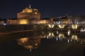 Rome Italy. Beautiful view of Castel Sant`Angelo and the bridge at night with reflections on the Tiber river Royalty Free Stock Photo