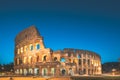 Rome, Italy. Colosseum Also Known As Flavian Amphitheatre In Evening Or Night Time Royalty Free Stock Photo