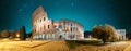 Rome, Italy. Colosseum Also Known As Flavian Amphitheatre In Evening Or Night Time. Travel Italy. Bright Blue Night Sky Royalty Free Stock Photo