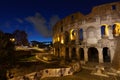 Rome, italy, colosseum old ancient building gladiator battle at night Royalty Free Stock Photo