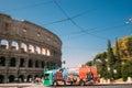 Rome, Italy. Colosseum. Red Hop On Hop Off Touristic Bus For Sightseeing In Street Near Flavian Amphitheatre. Famous Royalty Free Stock Photo