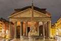 Rome, Italy cylindrical Pantheon monument facade at night. Illuminated view of iconic dome temple with no crowd at Rotonda square Royalty Free Stock Photo