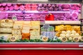 Cheese department. Variety of Italian cheeses. Showcase with different dairy products. Royalty Free Stock Photo