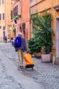 Rome, Italy - December 17, 2019: Elderly senior Italian man walking in historic city