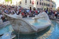 Rome, Italy, Europe - August 18, 2015: Crowds of tourists gather around the Spanish Steps and a boat-shaped fountain on Piazza di