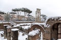 Snow covers the streets of Rome, Italy. Forum of Caesar.