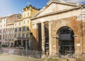 Frontal view of Portico d`Ottavia in Rome