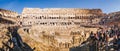 Rome, Italy, February 2018: Tourists anjoying the panorama inside Colosseum, Rome, Italy