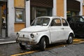 Vintage white Fiat car parked in street Royalty Free Stock Photo