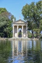 Rome Italy. Garden of Villa Borghese. Lake with boats and temple